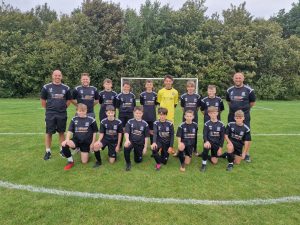 U13 Welton Arrows. Pre match versus Welton Bombers, wearing the training kit provided by one of our sponsors Lincs ADAS solutions.